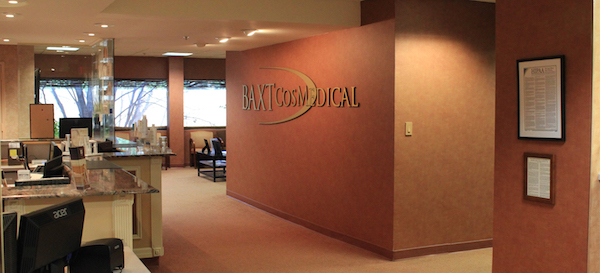 BAXT CosMedical reception area with logo sign
