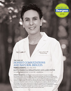 Black and white photo Dr. Rebecca Baxt in a lab coat for Faces of Bergen article